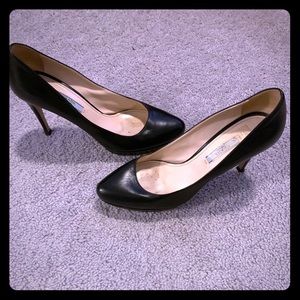 Prada black leather platform pumps